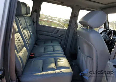 2002 Mercedes-Benz G 500 z USA, uszkodzony, nr VIN WDCYR49EX2X128555